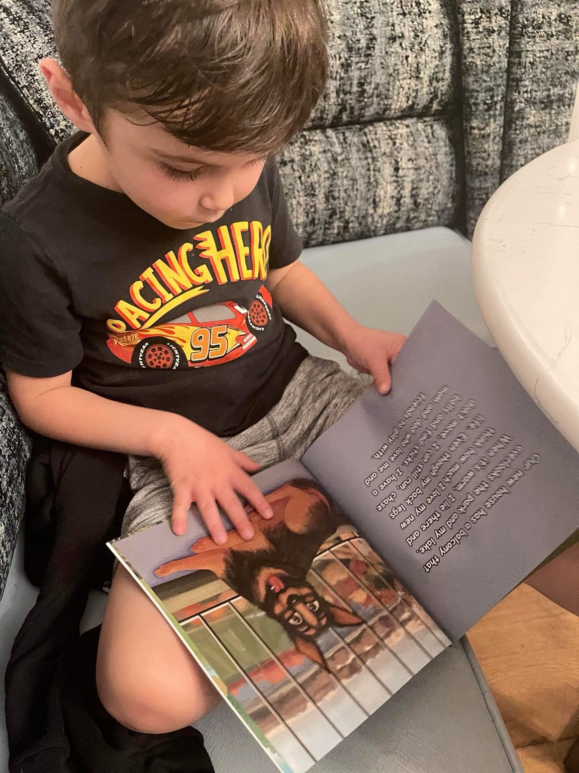A child reading Dante's Cool Wheels